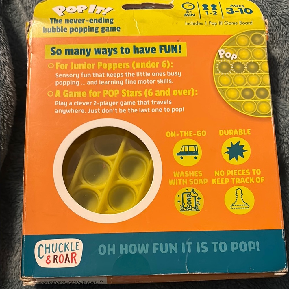 Chuckle & Roar Pop It 
Yellow Bubble Toy